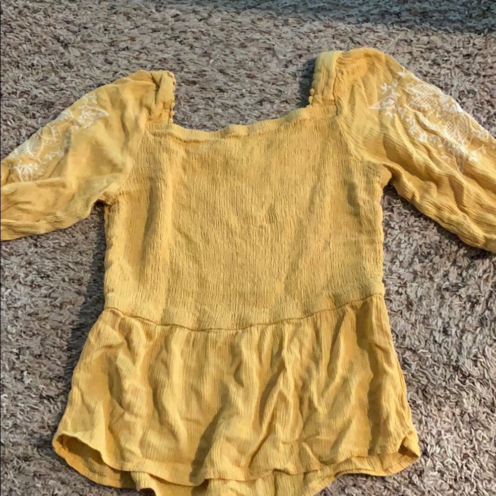 yellow mid shirt